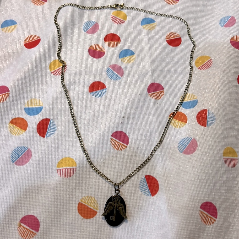 Faux gold Harry Potter winged key necklace